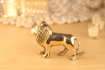 Golden brass lion statue