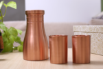 Copper handicraft hammered jar and 2 glasses