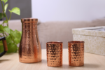 Copper handicraft hammered jar and 2 glasses