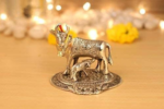 metal kamdhenu cow and calf statue